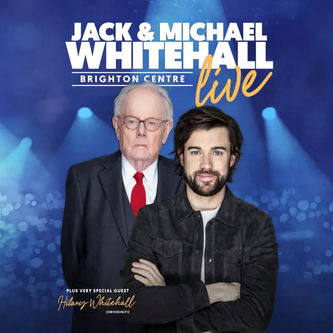 image Jack & Michael Whitehall pictured together facing straight to camera. Jack has his arms folded smiling as his Dad looks over Jack's shoulder not smiling